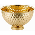 Die Gestaltung von dem Sideboard wird durch Metall gepraegt in Gold